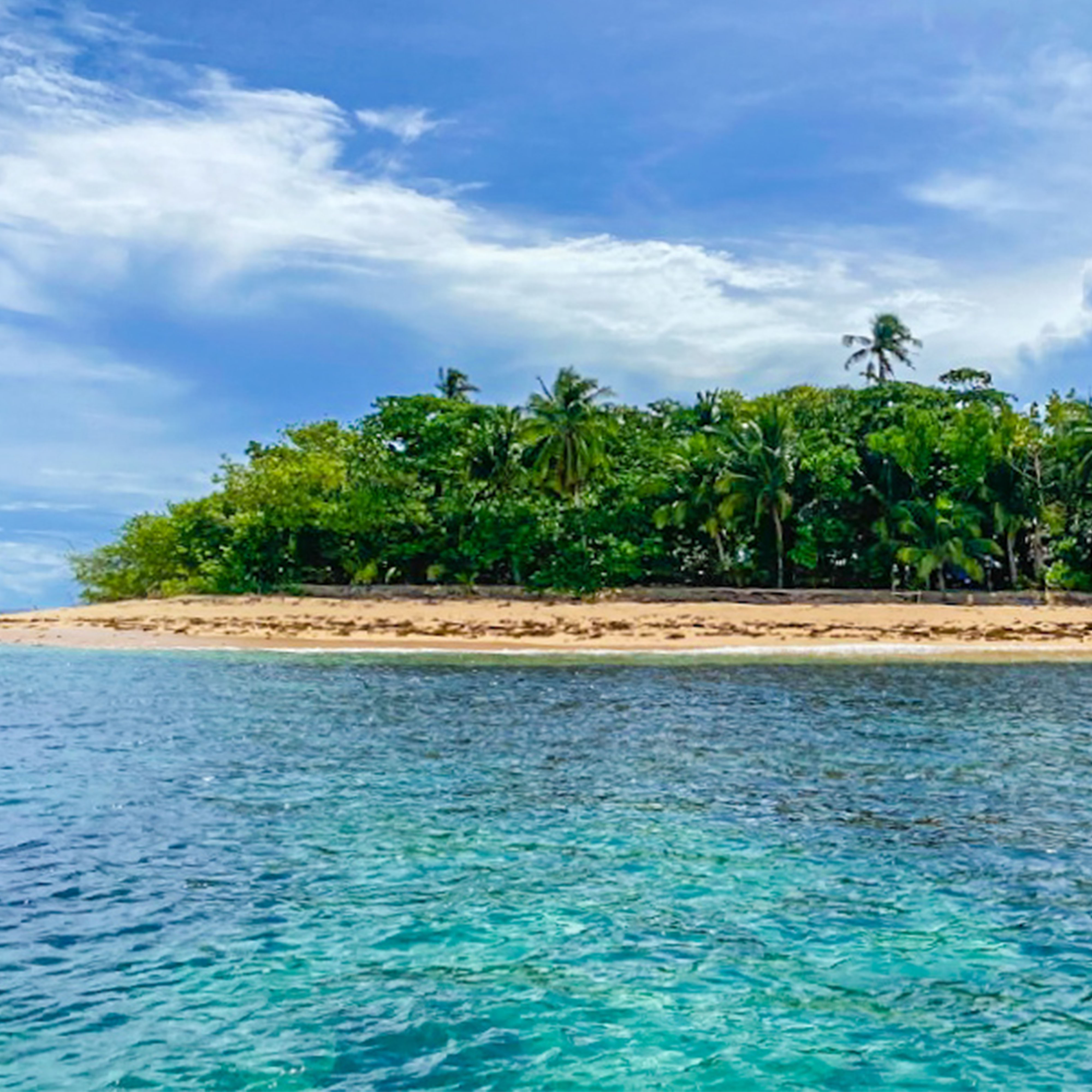 <b class="font-bara"><i class="bi bi-geo-fill h4"></i> BONBON ISLAND</b> <br/>Located at the farthest part of the Britania Group of Islets, Brgy. Britania, San Agustin, SDS.